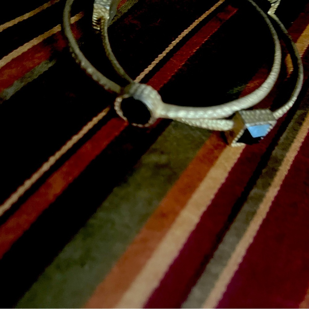 Gold bangles with stones